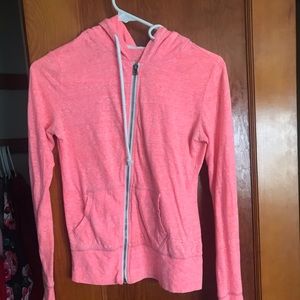 A pink zip up jacket